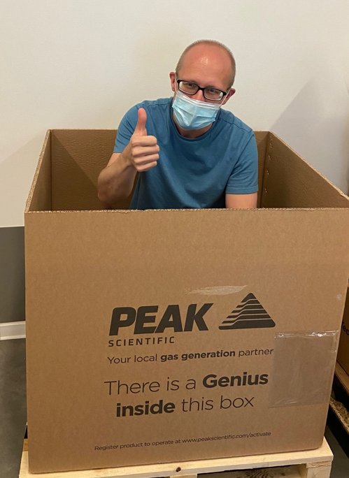 Michael Jacobsen inside the PEAK Genius XE 35 nitrogen gas generator box