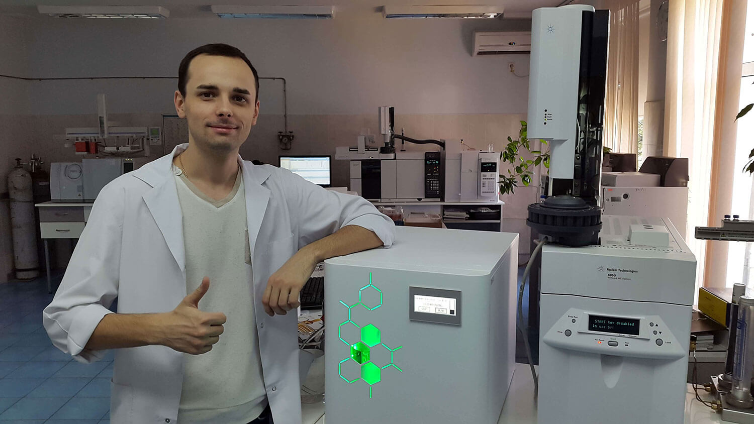 Lab personnel next to Precision gas generator