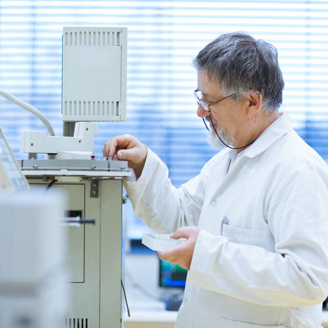 Photodune 1654942 Senior Male Researcher Carrying Out Scientific Research In A Lab L