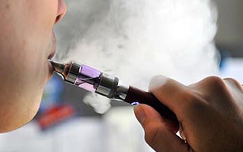 Someone smoking and e-cig