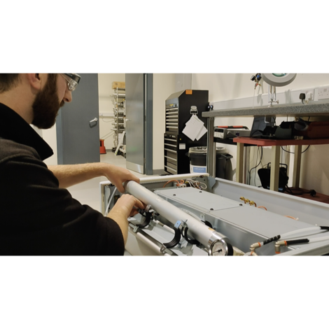 Engineer repairing a gas generator